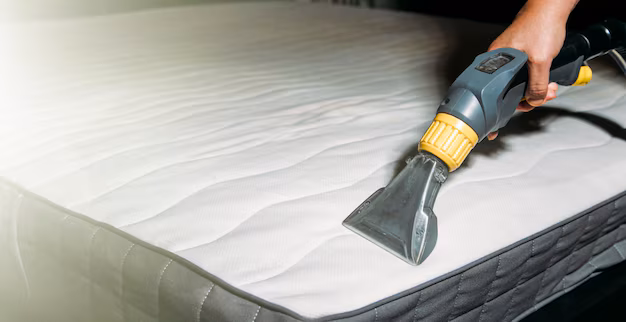 cleaning-mattress-with-vacuum-cleaner_325774-5202